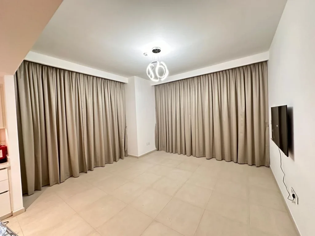 Empty modern living room with curtains